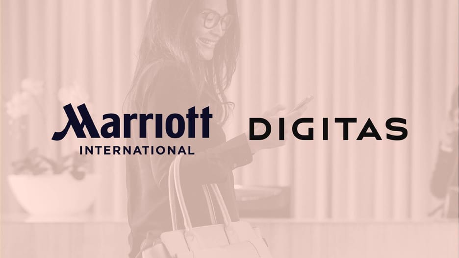 A smiling woman walks with a suitcase and handbag while looking at her phone, overlaid with the Marriott International and Digitas logos on a warm-toned background.