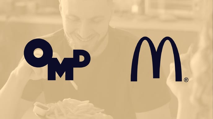 Image shows a person eating McDonald's fries with a yellow overlay and OMD + Mcdonalds logos over top