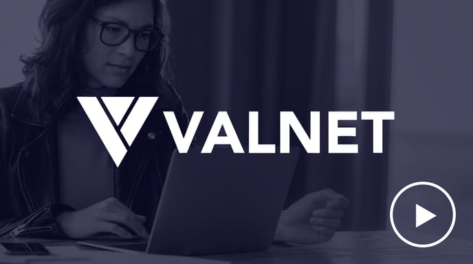 A woman working on a laptop is shown in a dark blue overlay with the VALNET logo prominently displayed in the foreground and a play button icon on the bottom right.