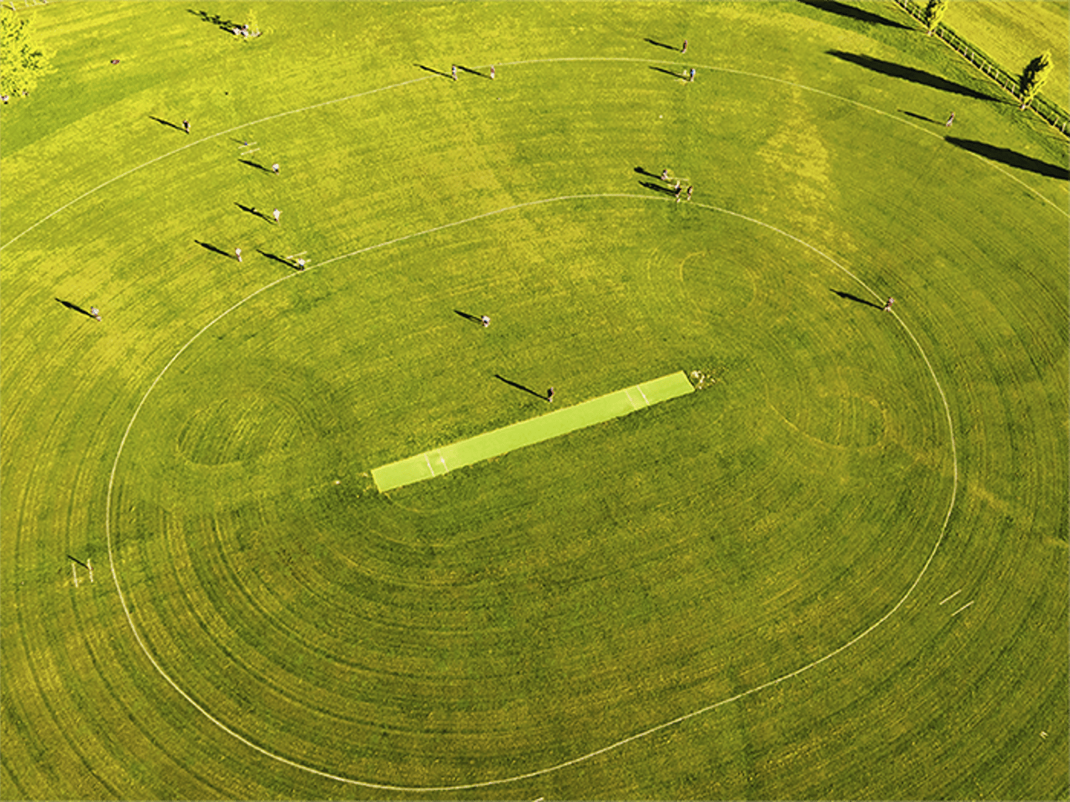 Green field with circular lines on it